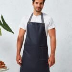 Premier District waxed-look denim bib apron - Aprons | Xcel UK