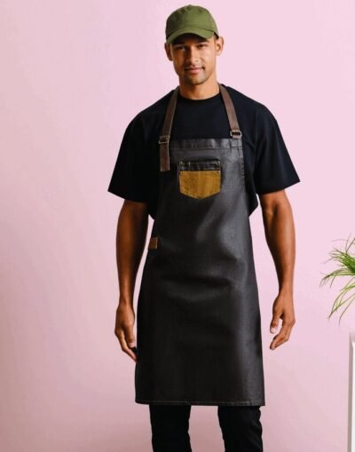 Premier Workwear DIVISION WAXED LOOK DENIM BIB APRON WITH FAUX LEATHER — Custom Embroidery Available
