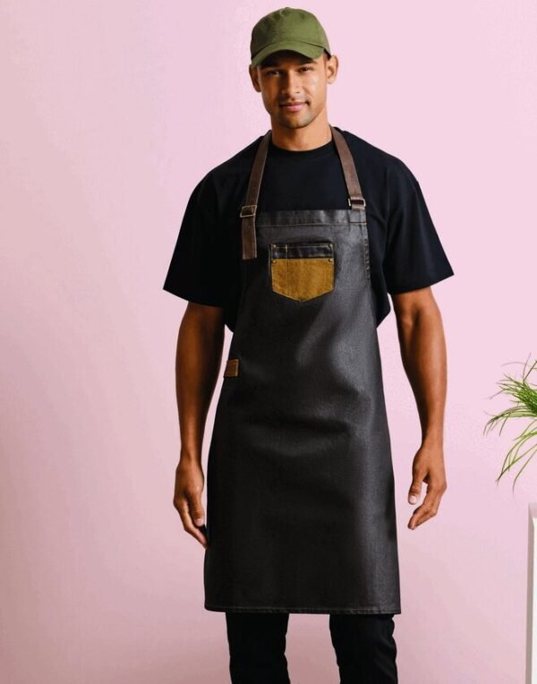 Premier Workwear DIVISION WAXED LOOK DENIM BIB APRON WITH FAUX LEATHER — Custom Embroidery Available